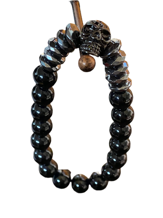 Obsidian Hematite Skull Bracelet with polished stones and skull design for style and protection.