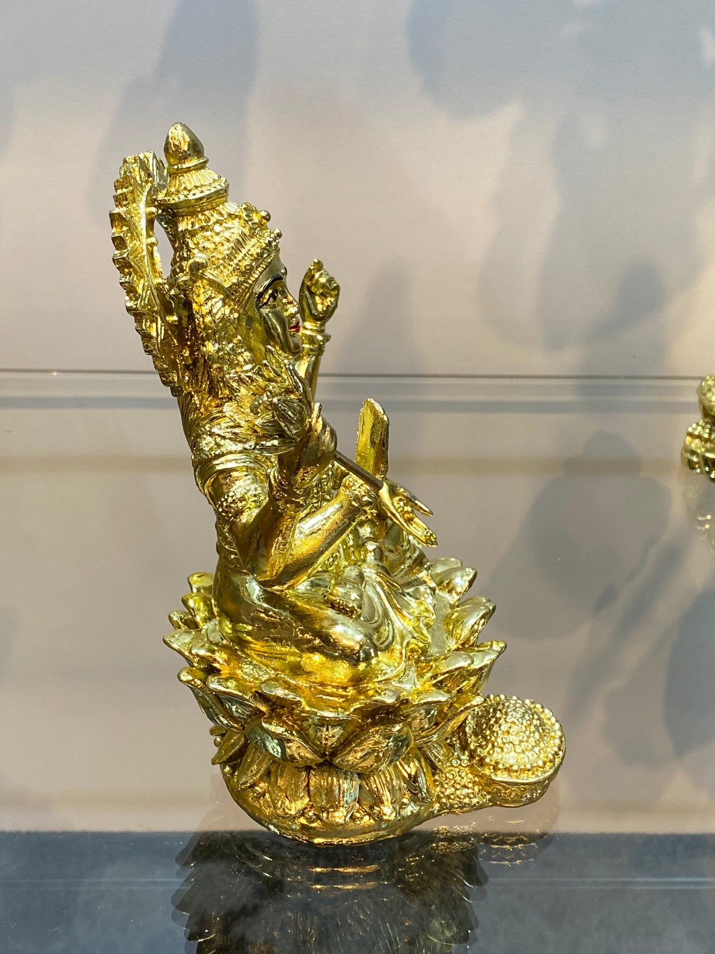 Goddess Lakshmi on Lotus Raining Gold Coins Bright Golden Color