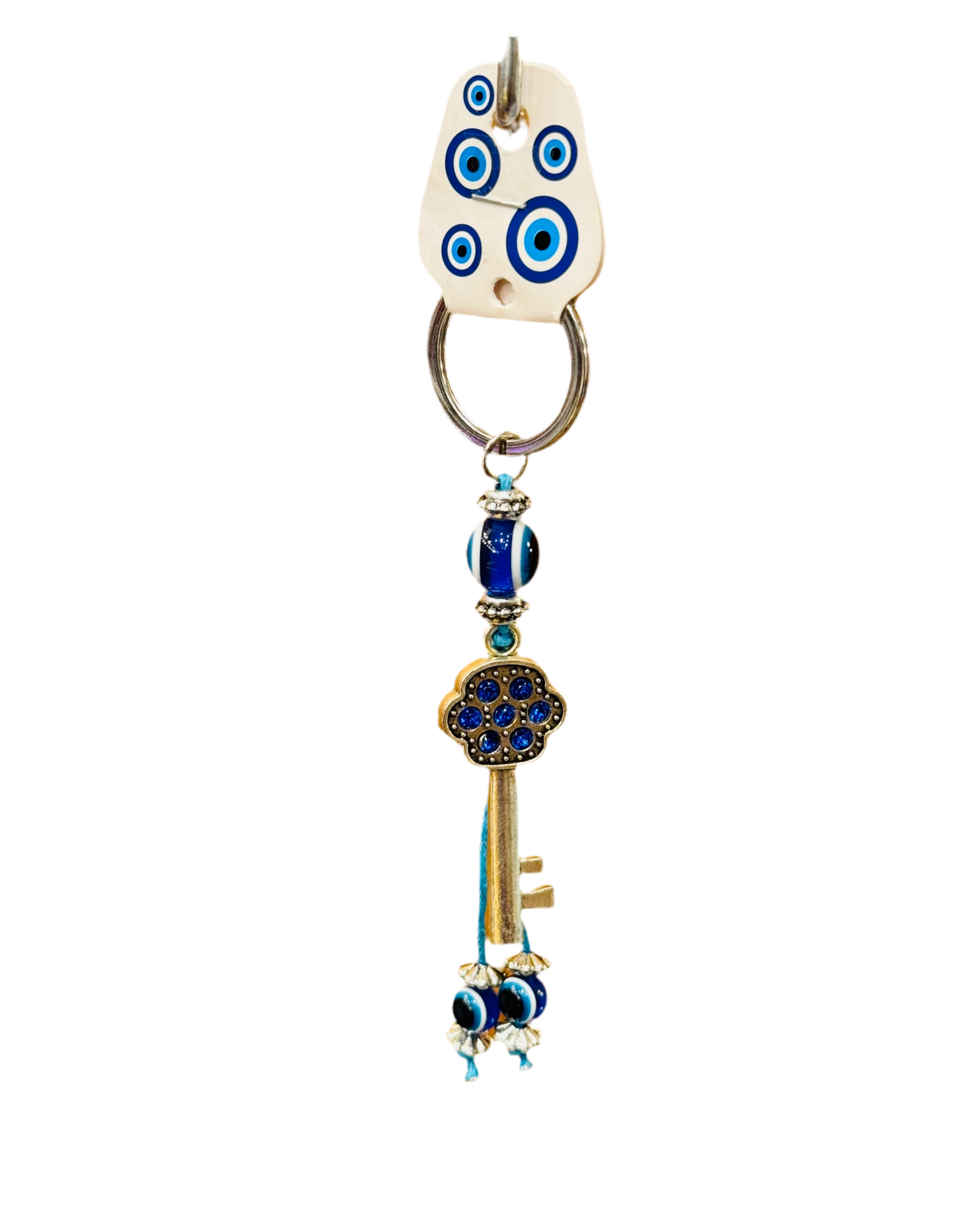 Ancient Key Blue Crystal Stones Evil Eye Keychain with intricate key design and blue crystals.