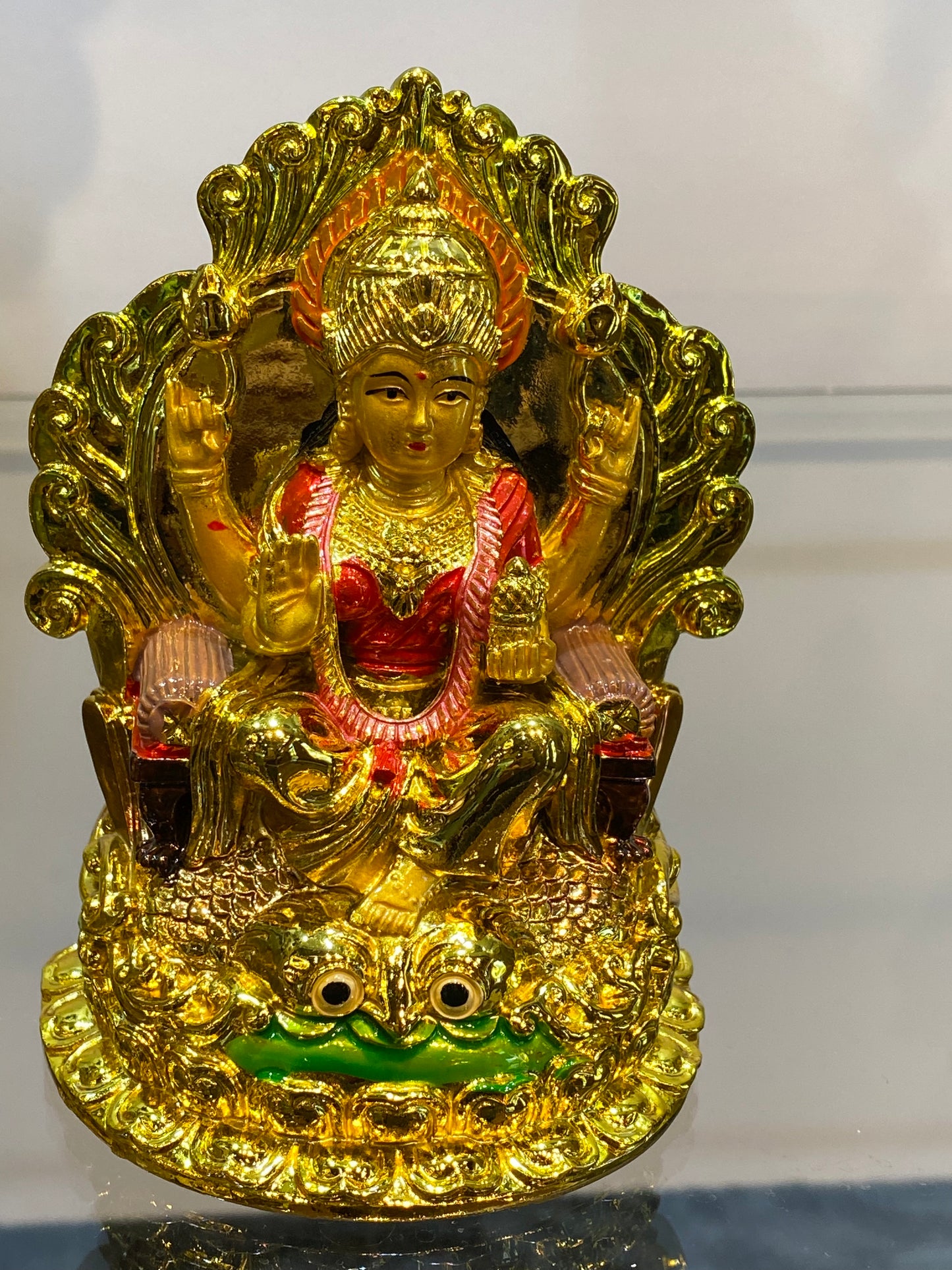 Golden Hindu Goddess Lakshmi on Owl Eyes