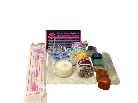 Beginner Chakra Balancing Kit with stones, incense, tea candle, sage smudge, and guide.