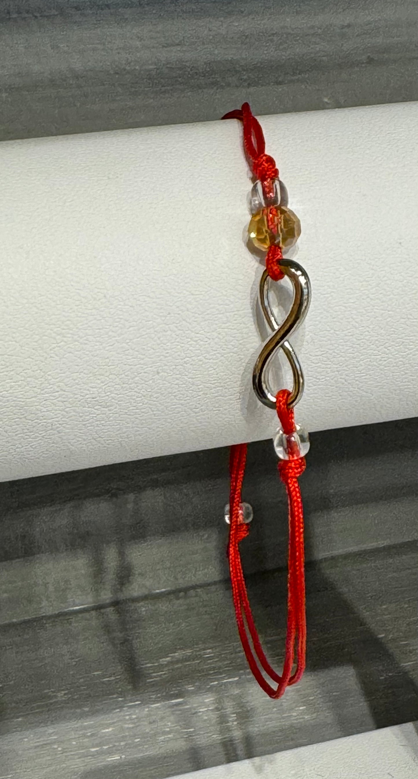Red String Pull Tie Bracelet Infinity Charm and Colorful Bead