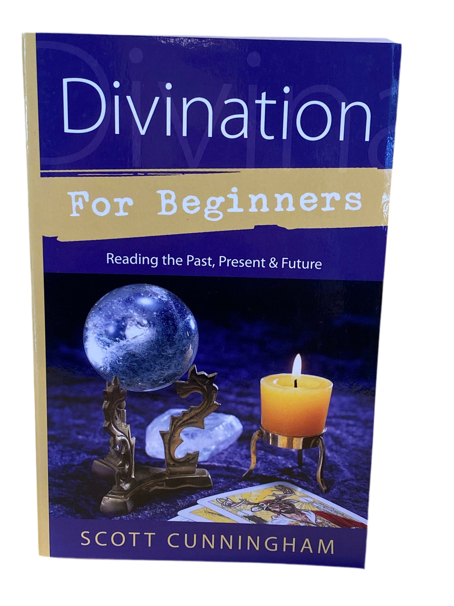 Divination for Beginners book cover by Scott Cunningham featuring a crystal ball and candle.
