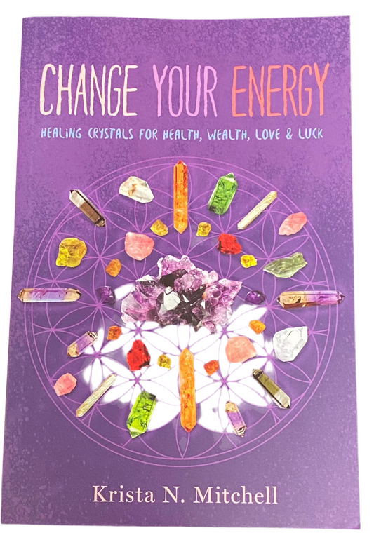 Change Your Energy book cover featuring crystals on a purple background by Krista N. Mitchell.