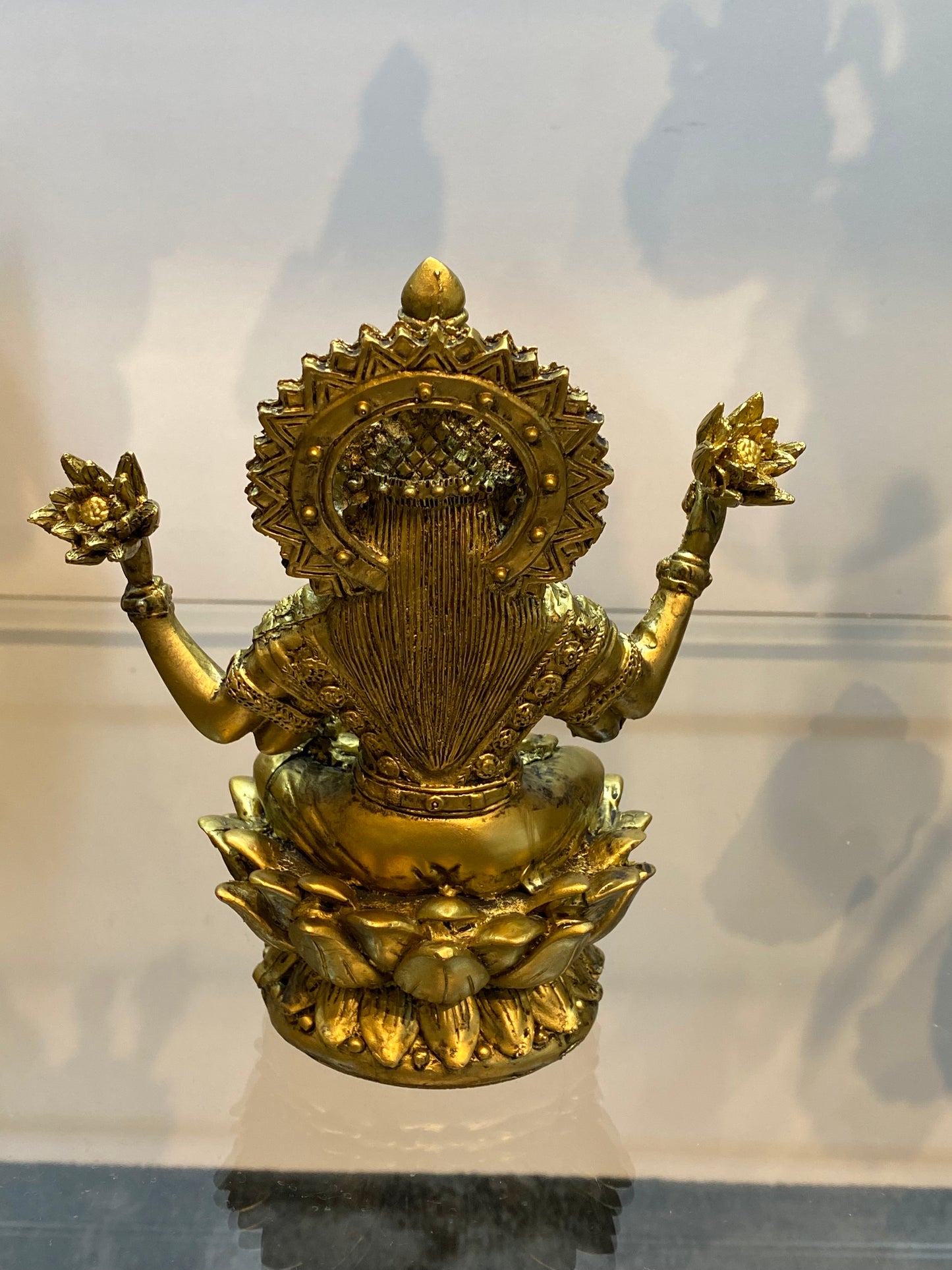 Goddess Lakshmi sitting on Lotus Raining Gold Coins Antique Golden Color