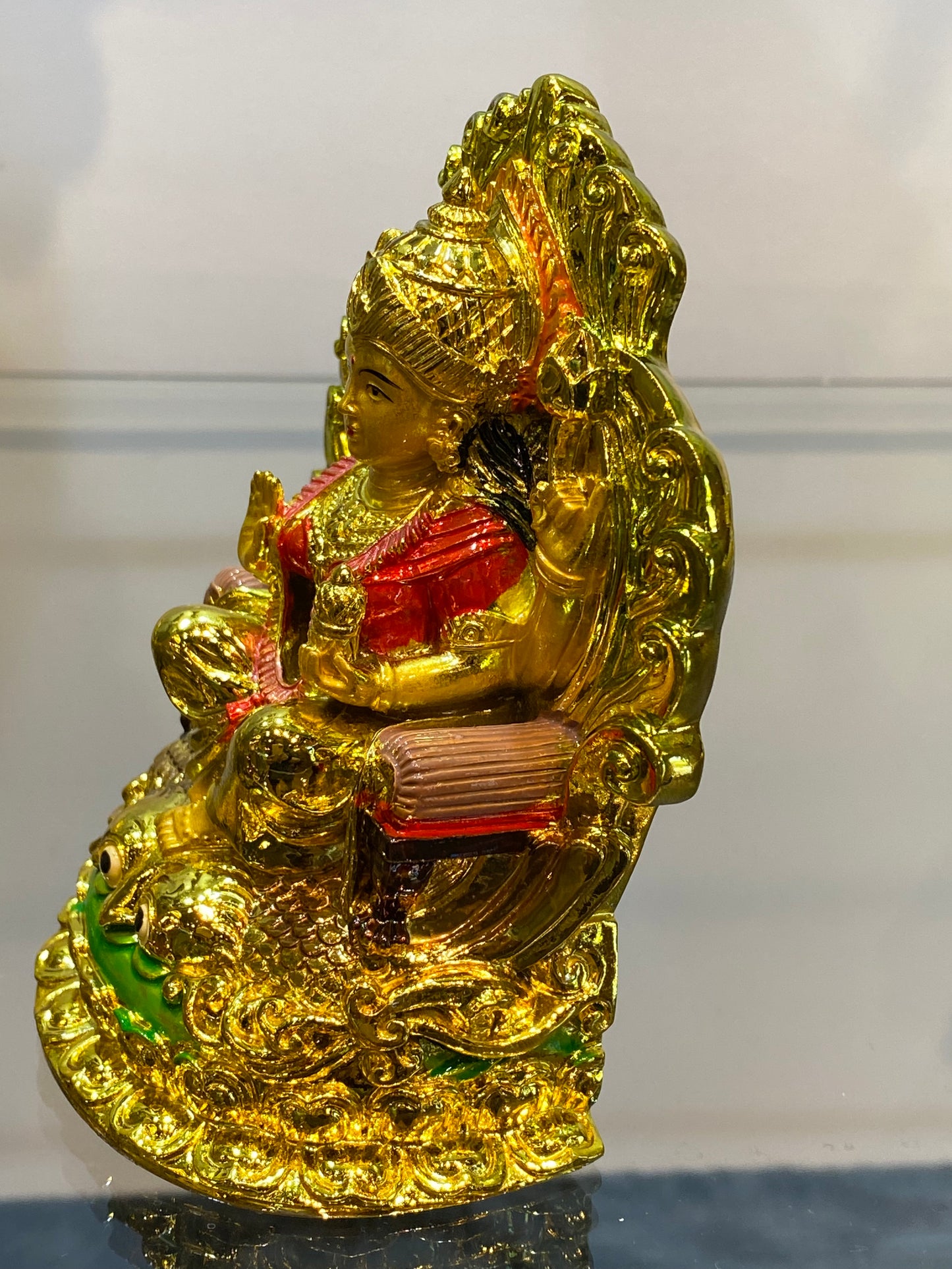 Golden Hindu Goddess Lakshmi on Owl Eyes