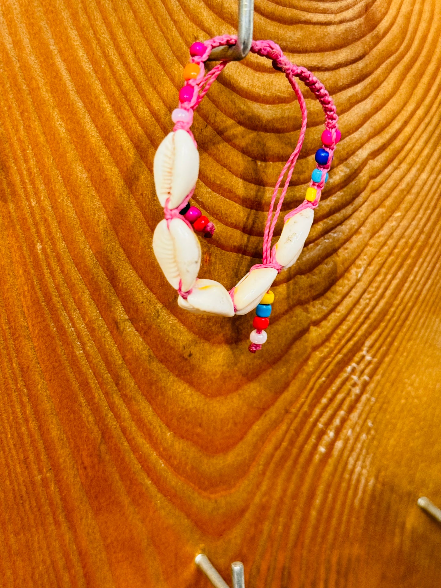 Handmade Pink String Bracelet With Cowrie Shells and Colorful Beads. Bright, joyful, and filled with ocean energy.