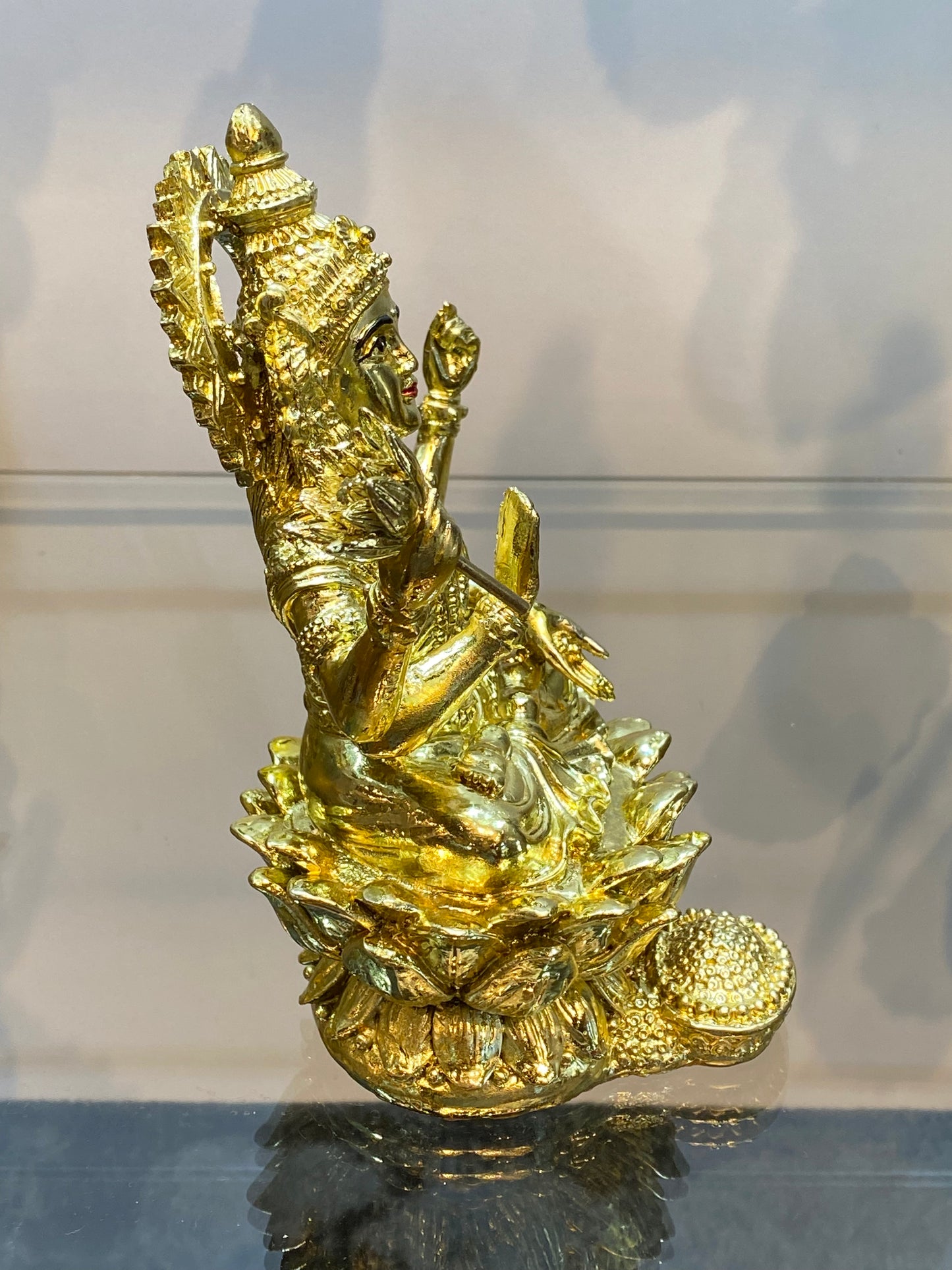 Goddess Lakshmi on Lotus Raining Gold Coins Bright Golden Color