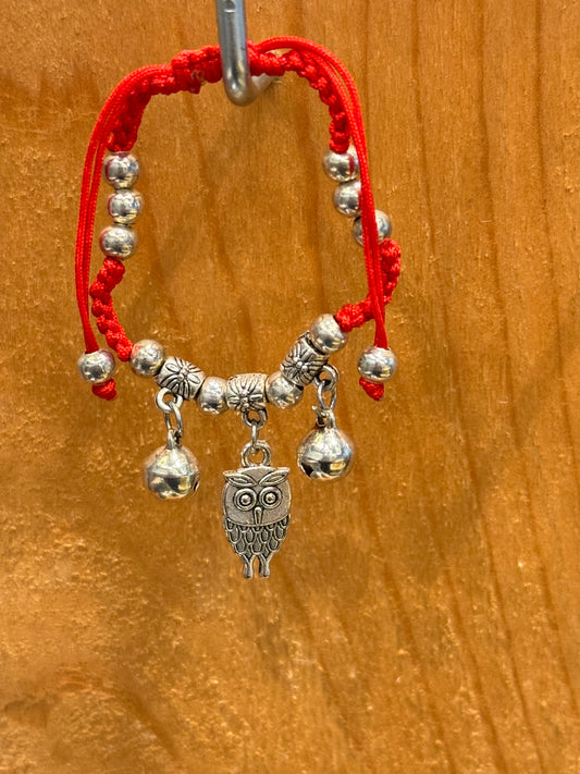 Red String Braided Pull Tie Bracelet with Silver Beads, Bells and Owl Charm