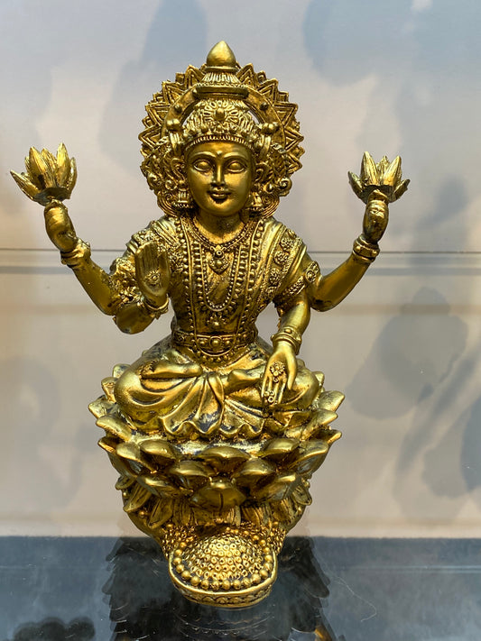 Goddess Lakshmi sitting on Lotus Raining Gold Coins Antique Golden Color