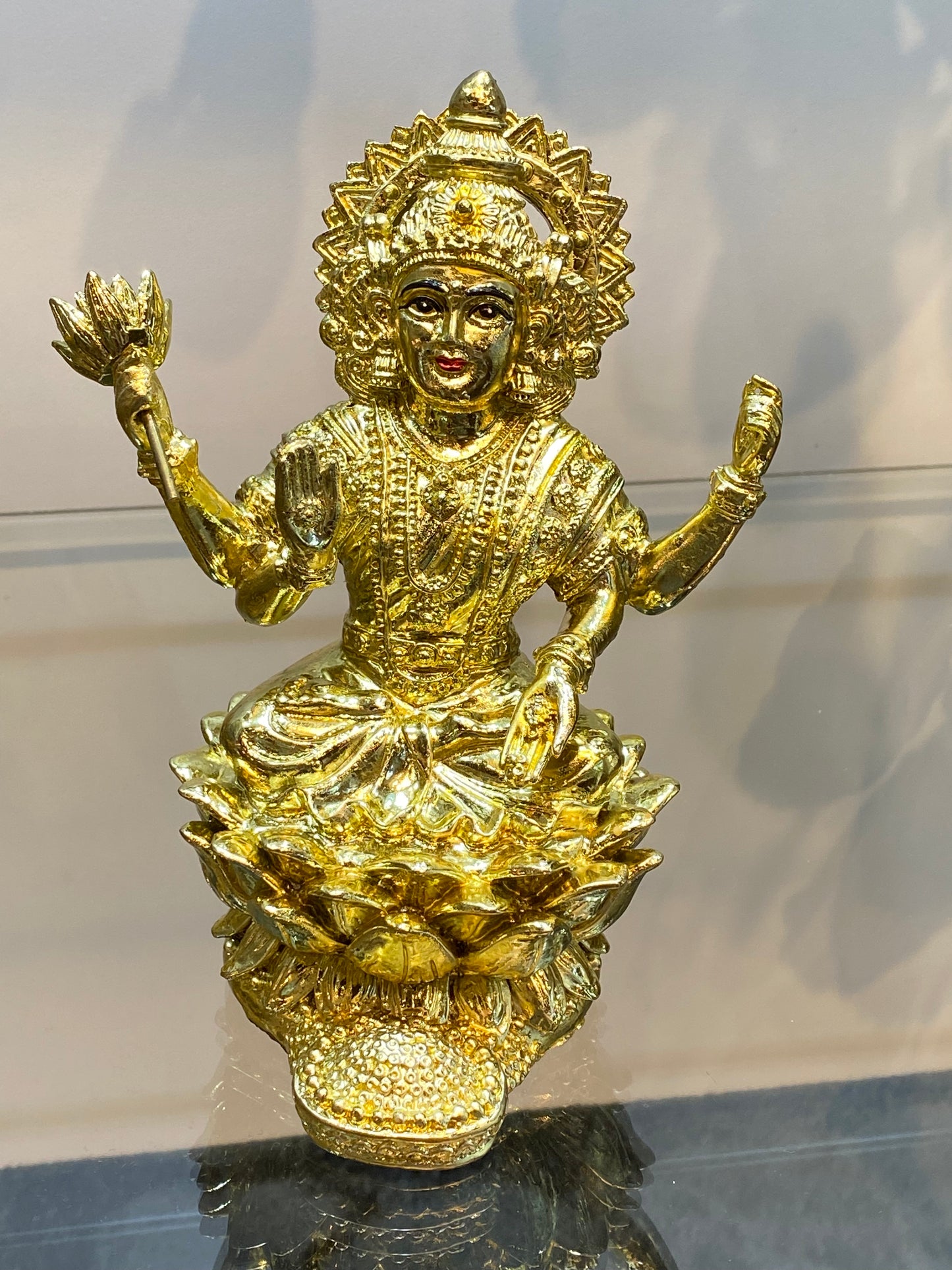 Goddess Lakshmi on Lotus Raining Gold Coins Bright Golden Color