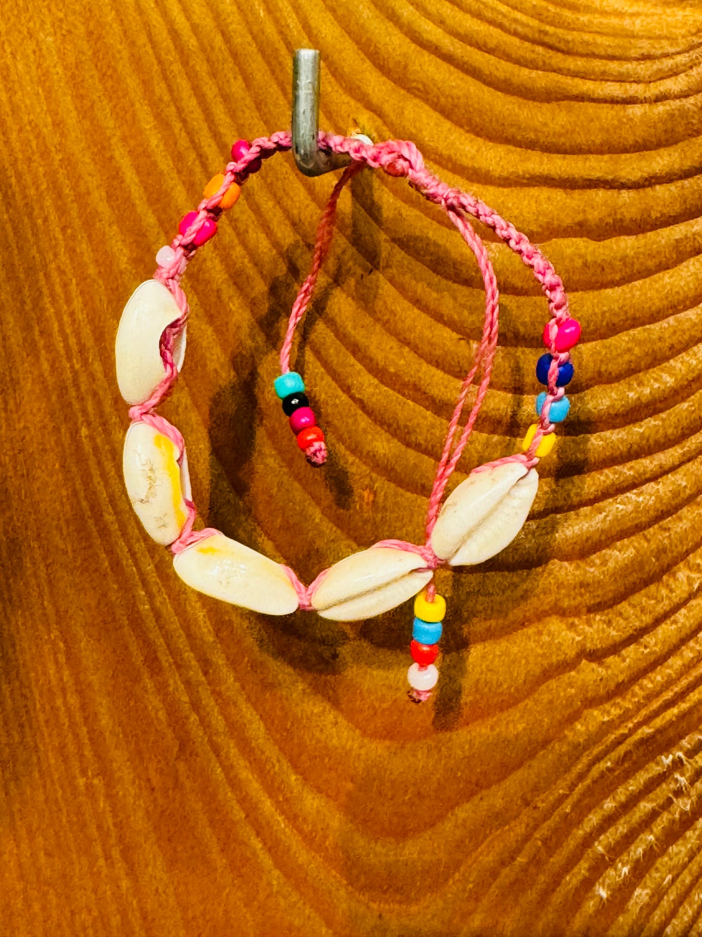 Handmade Pink String Bracelet With Cowrie Shells and Colorful Beads. Bright, joyful, and filled with ocean energy.