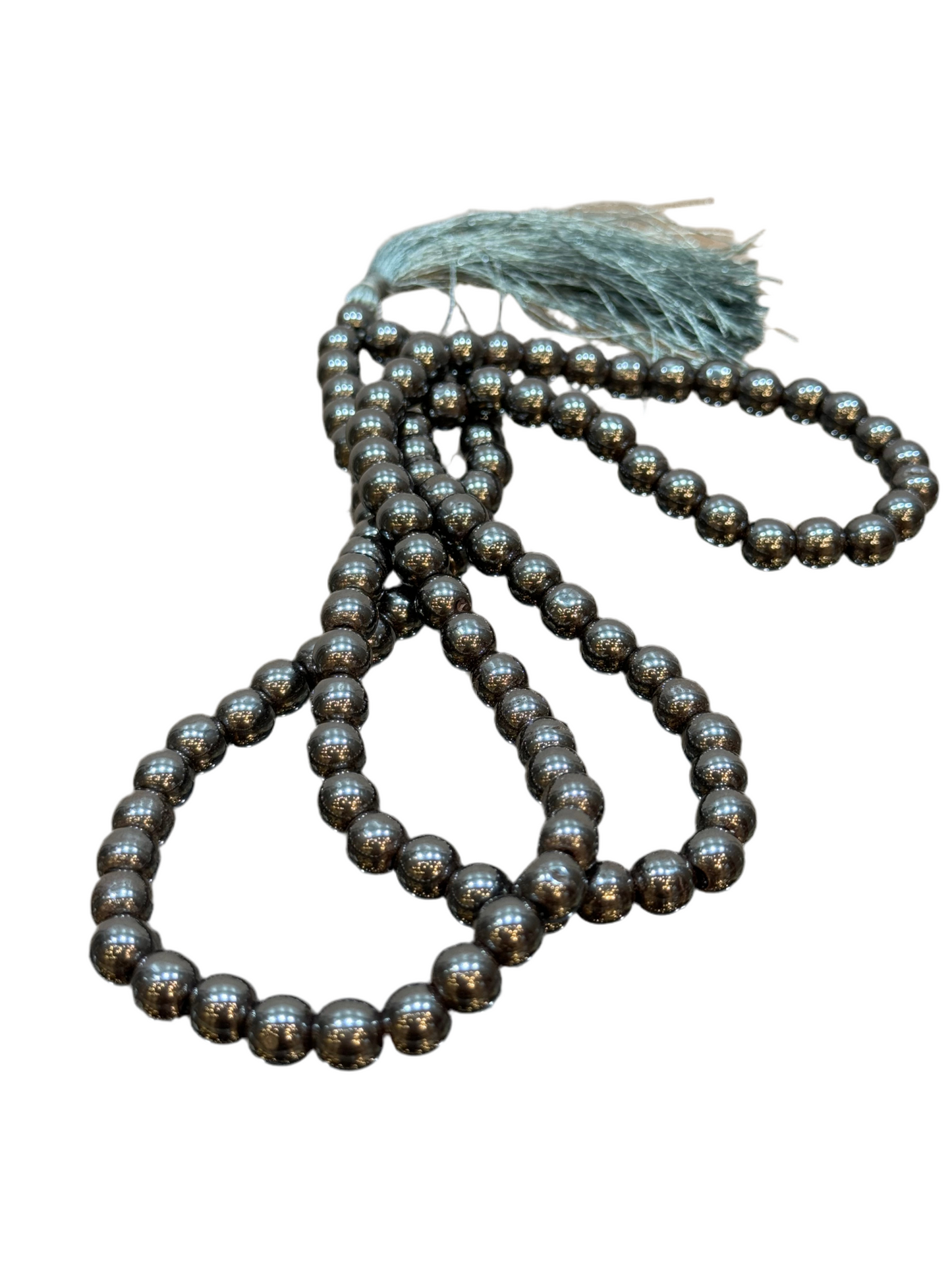 Hematite Prayer Mala with silver tassel for meditation and spiritual practice.
