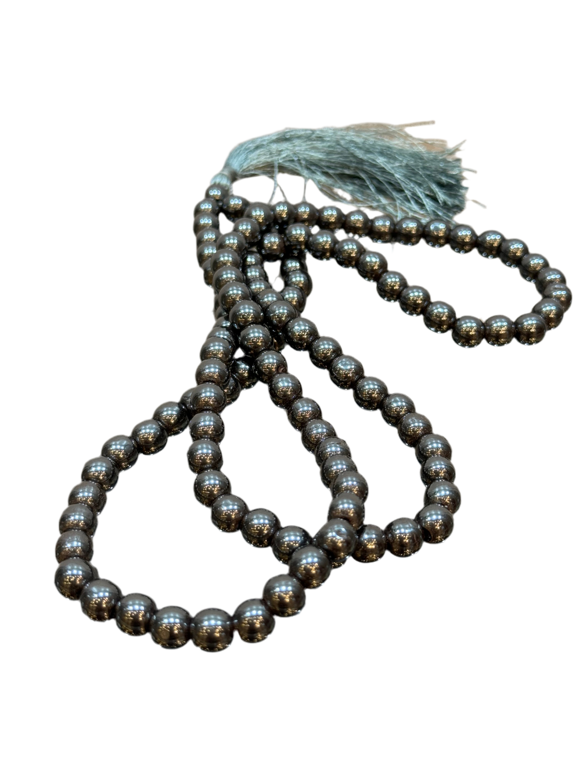 Hematite Prayer Mala with silver tassel for meditation and spiritual practice.