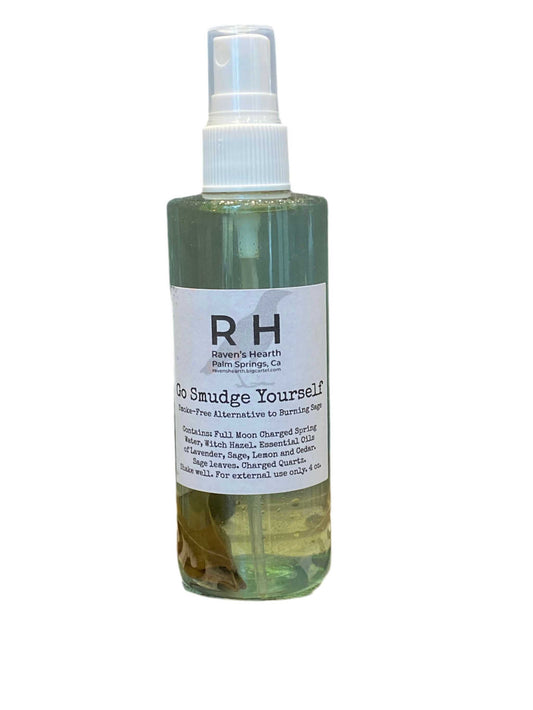 Go Smudge Yourself Mist Raven's Hearth bottle for cleansing negative energy and promoting balance.