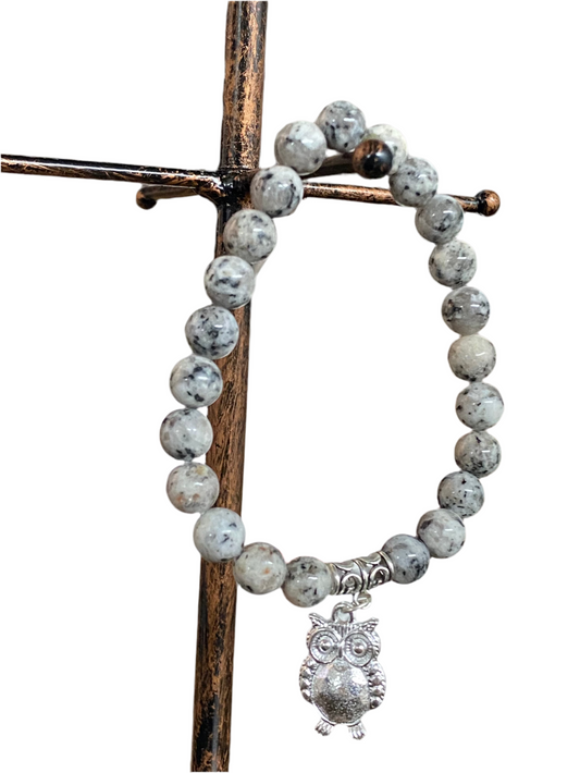 Black Sesame Gemstone Bracelet with Owl Charm featuring black sesame jasper beads and owl charm, symbolizing wisdom and protection.