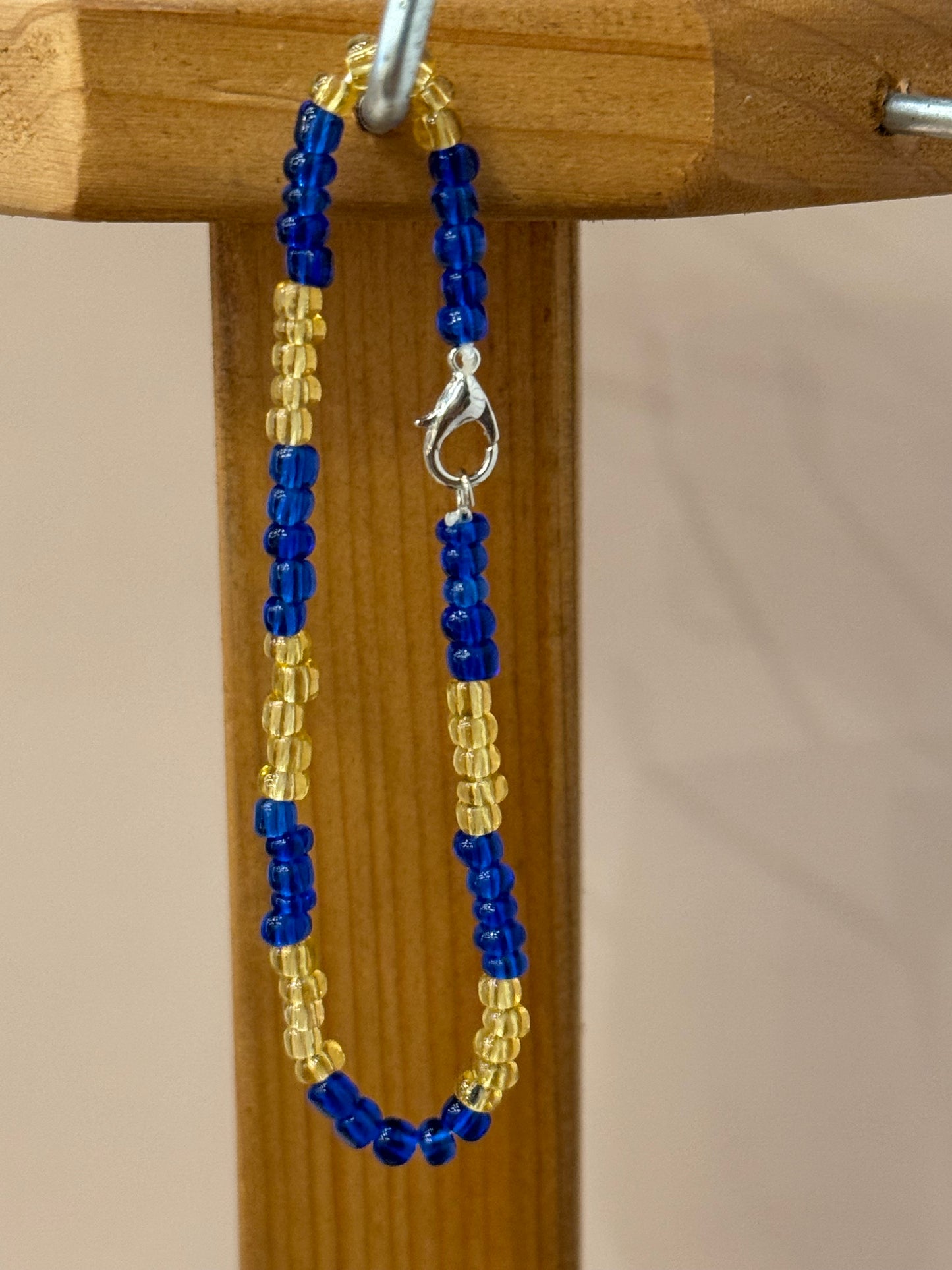 Ochosi Orisha of the Wilderness Blue and Yellow Gold Beaded Bracelet