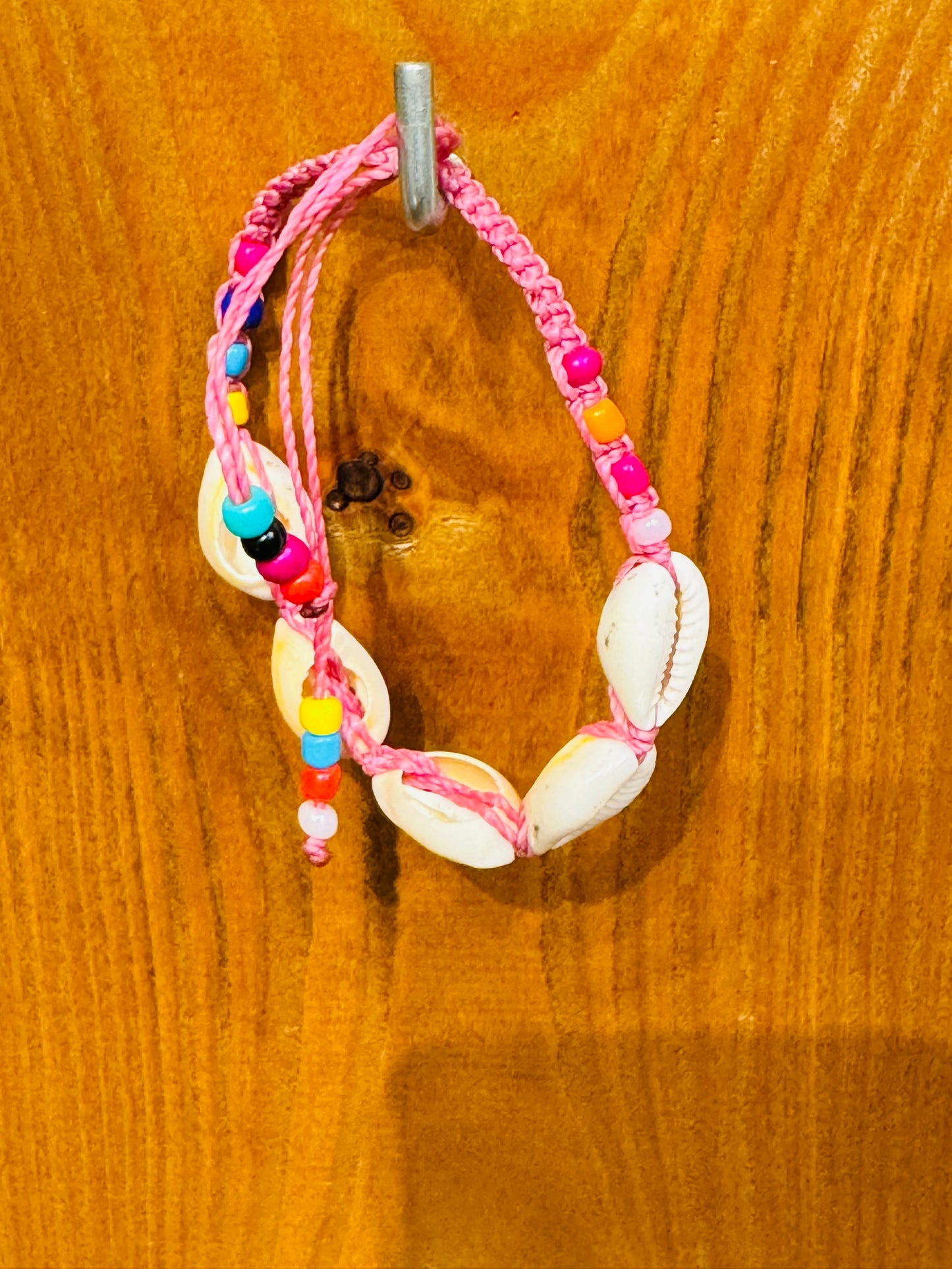 Handmade Pink String Bracelet With Cowrie Shells and Colorful Beads. Bright, joyful, and filled with ocean energy.