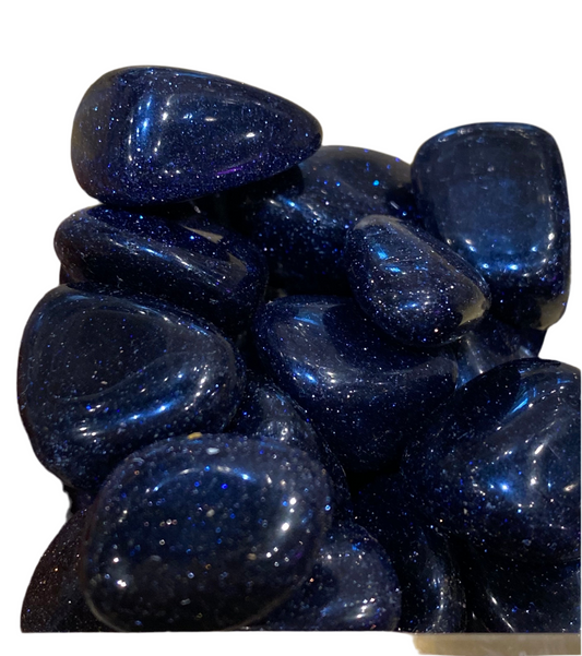 Blue Goldstone Tumbled Stones displaying deep blue color and sparkling appearance.