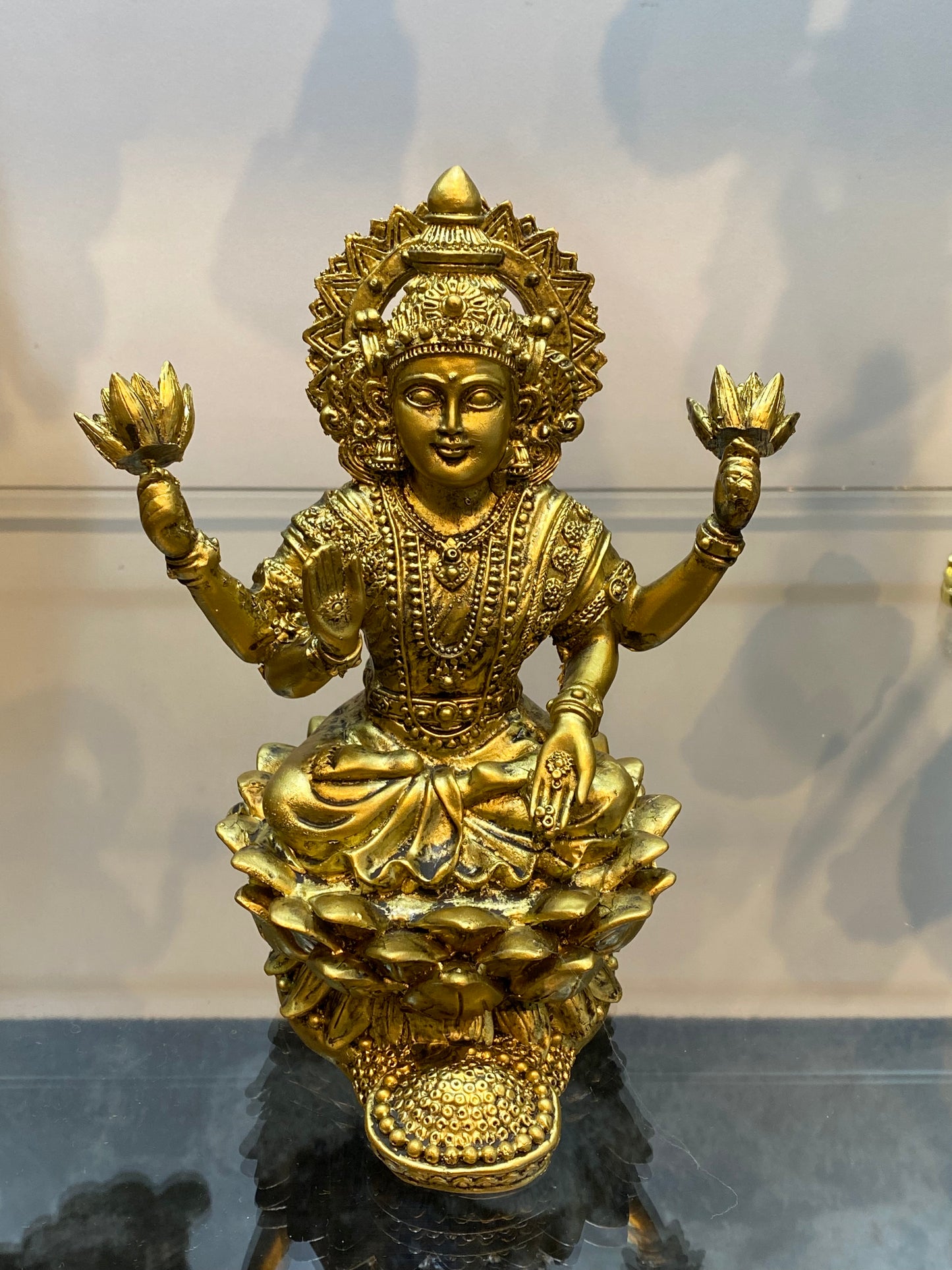 Goddess Lakshmi sitting on Lotus Raining Gold Coins Antique Golden Color