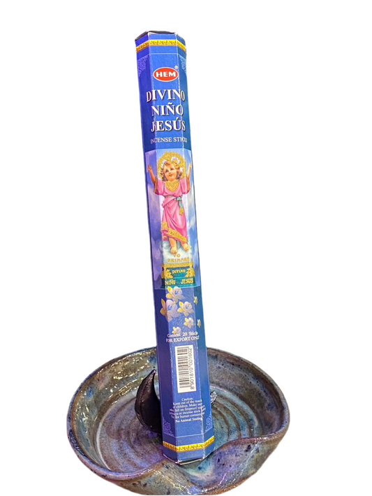 HEM Divino Nino Jesus Incense Sticks in a decorative holder.