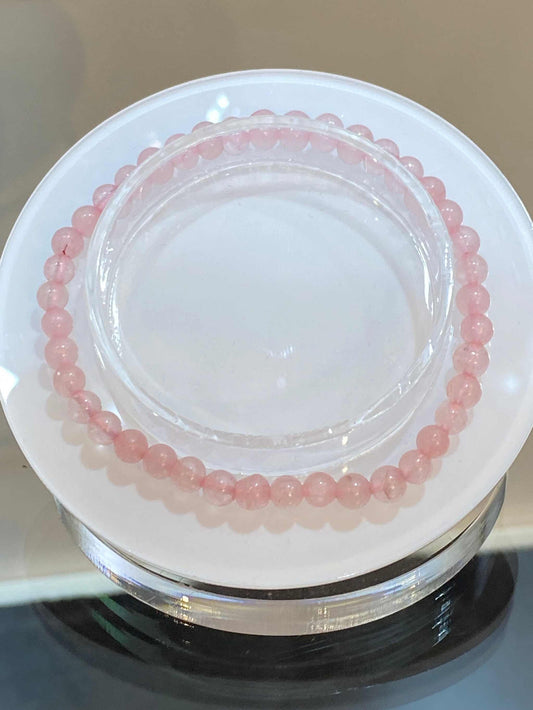 Rose Quartz Gemstone Bracelet 4mm promoting love and emotional balance.