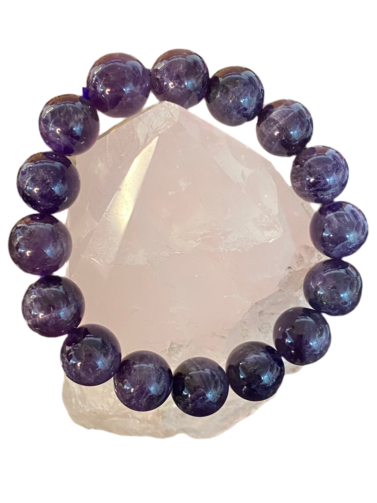 Amethyst Gemstone Bracelet 12 mm with polished deep purple beads.