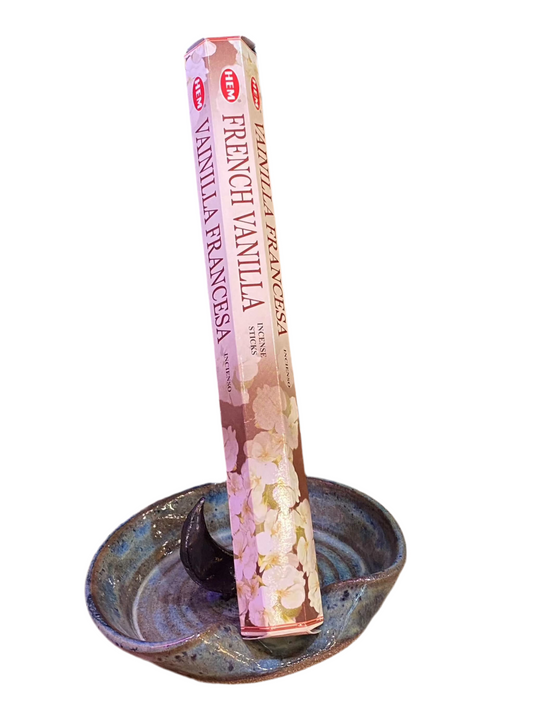 HEM French Vanilla Incense Sticks in a decorative holder, offering a rich, creamy aroma.
