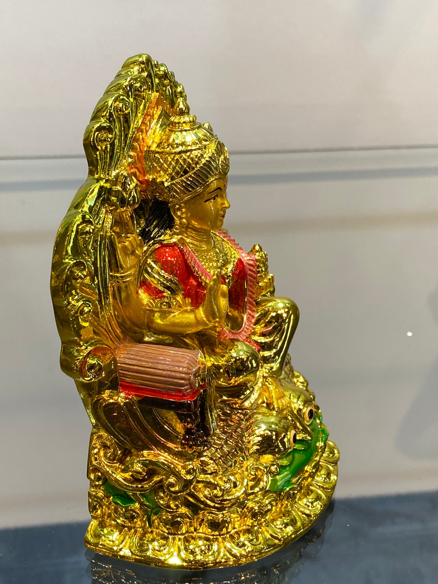 Golden Hindu Goddess Lakshmi on Owl Eyes