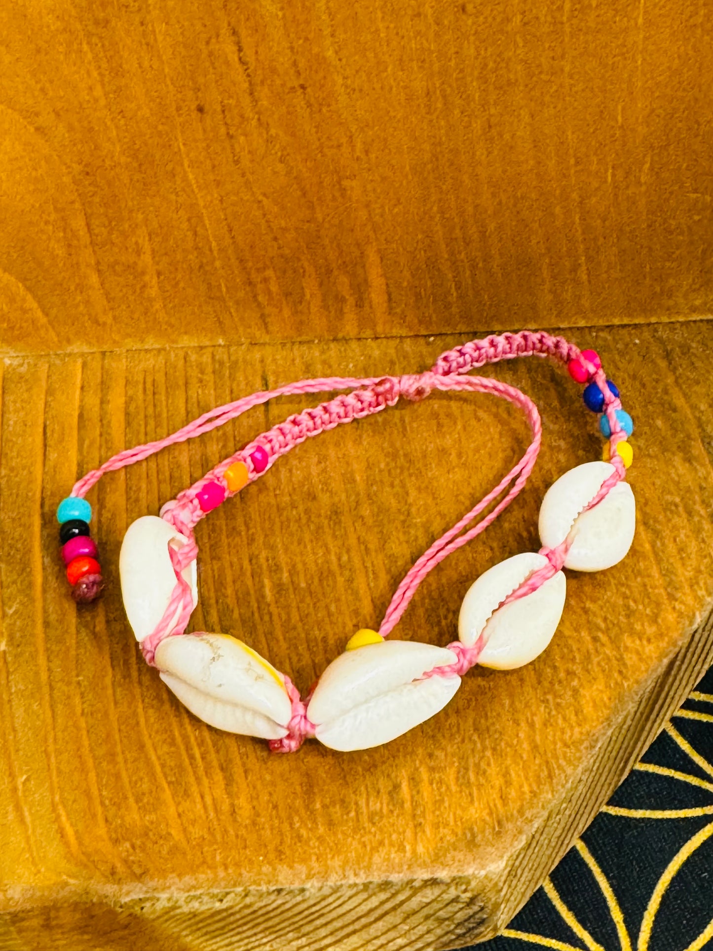 Handmade Pink String Bracelet With Cowrie Shells and Colorful Beads. Bright, joyful, and filled with ocean energy.