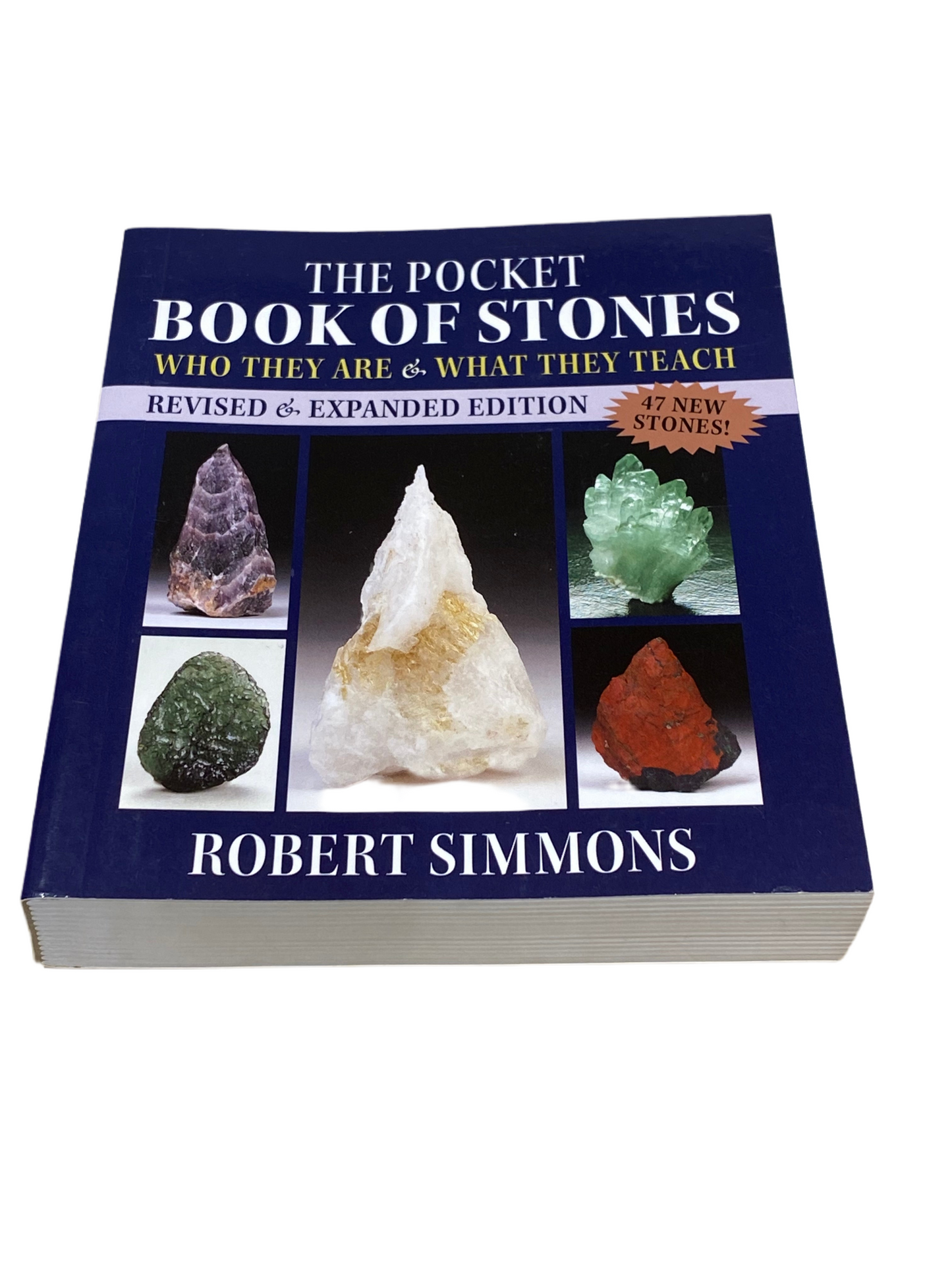 Pocket Book of Stones by Robert Simmons, revised edition cover featuring various crystals.