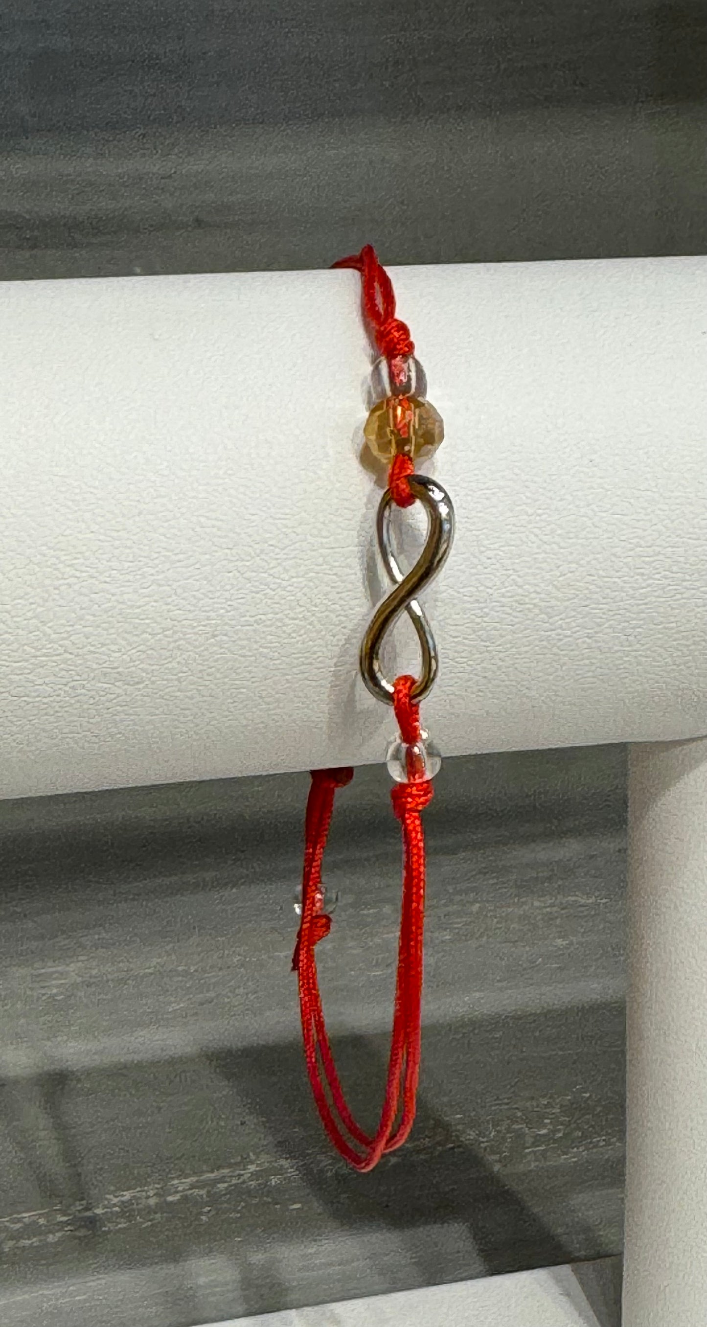 Red String Pull Tie Bracelet Infinity Charm and Colorful Bead