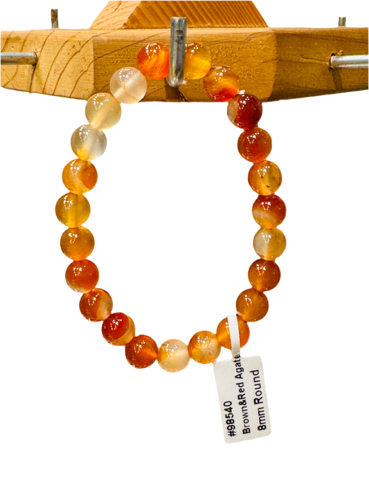 Brown and Red Agate Beaded String Bracelet with polished beads hanging on display.