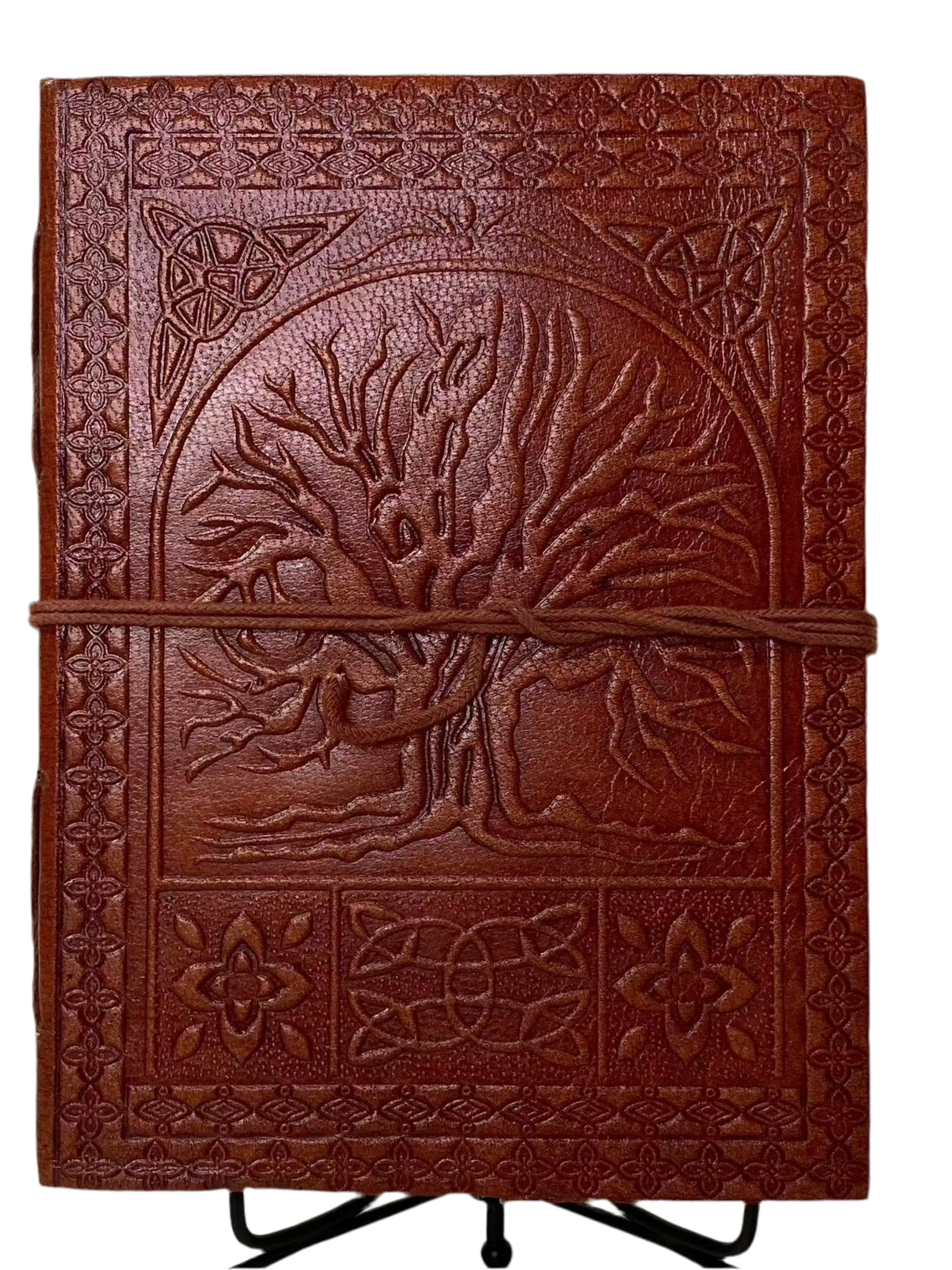 Sacred Oak Tree Leather Journal with embossed oak tree design and cord closure.