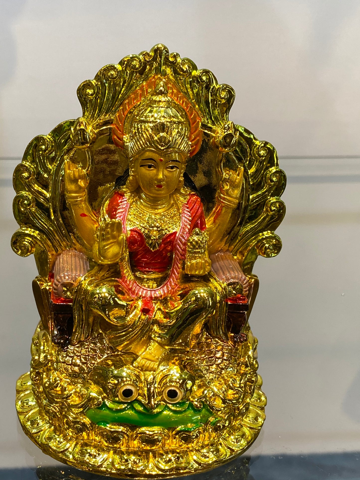 Golden Hindu Goddess Lakshmi on Owl Eyes