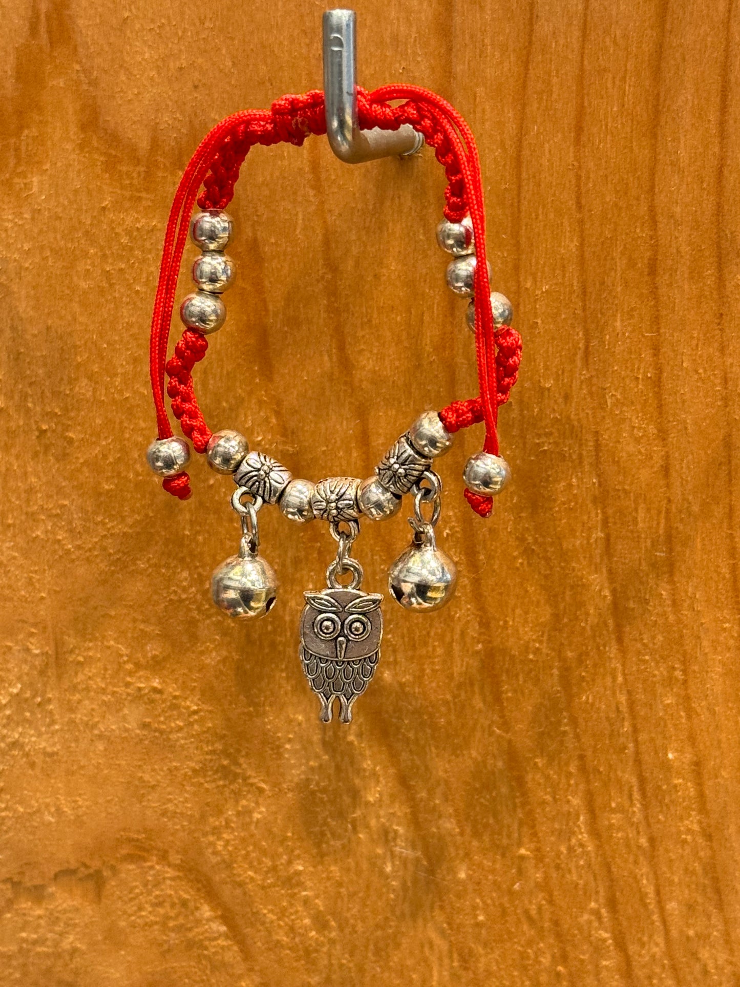 Red String Braided Pull Tie Bracelet with Silver Beads, Bells and Owl Charm