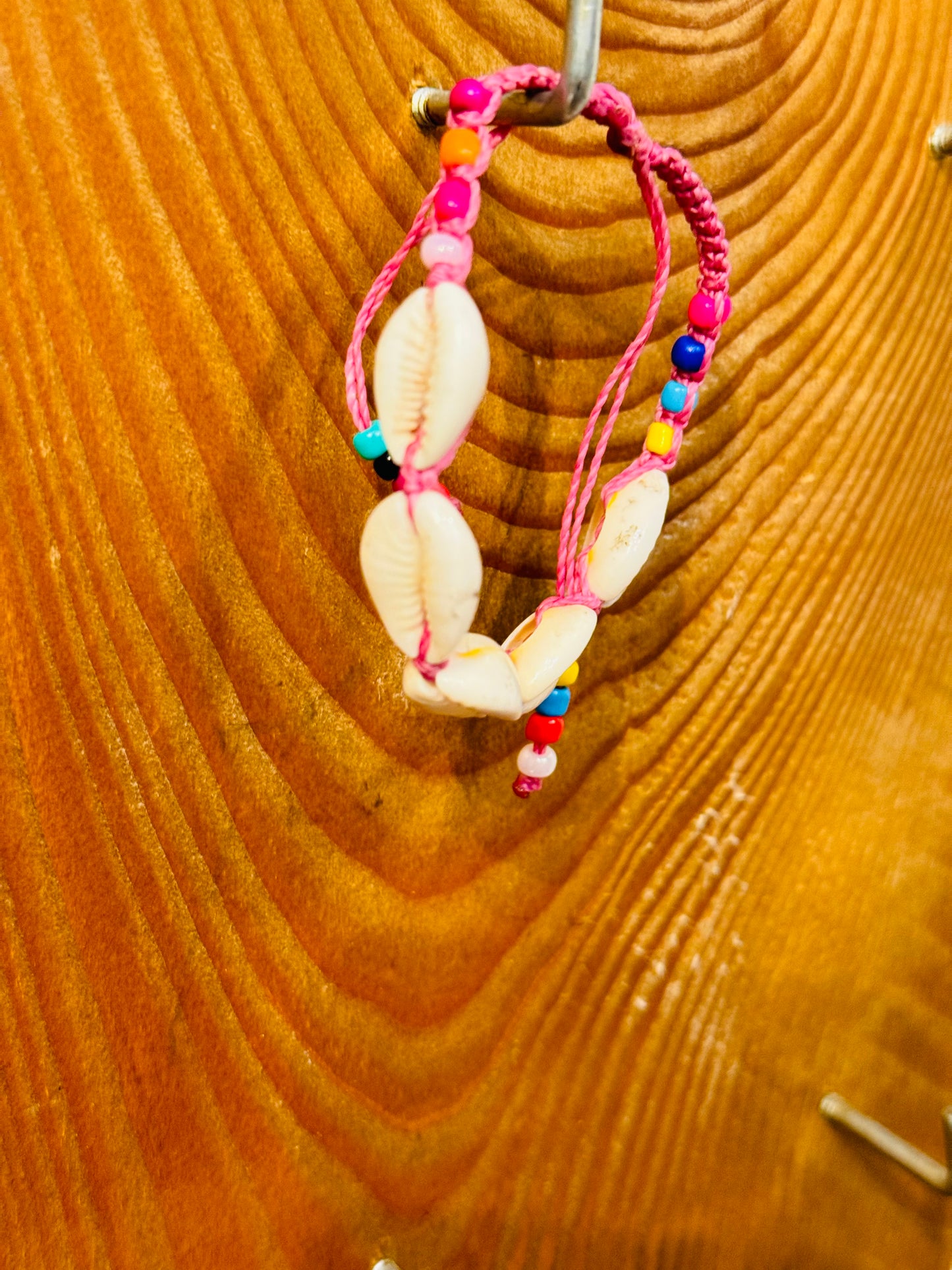 Handmade Pink String Bracelet With Cowrie Shells and Colorful Beads. Bright, joyful, and filled with ocean energy.