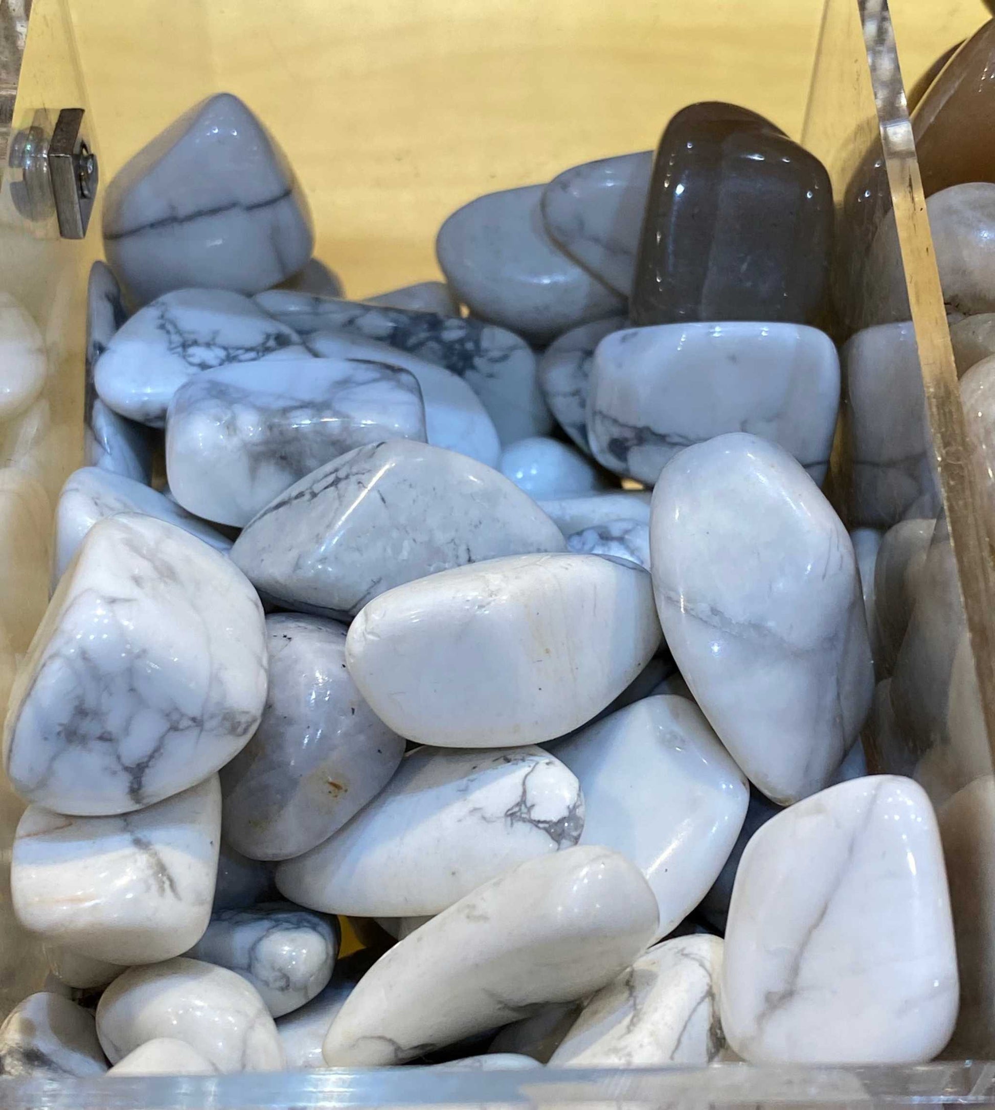 Howlite tumbled stones for calming, sleep aid, and high quality.