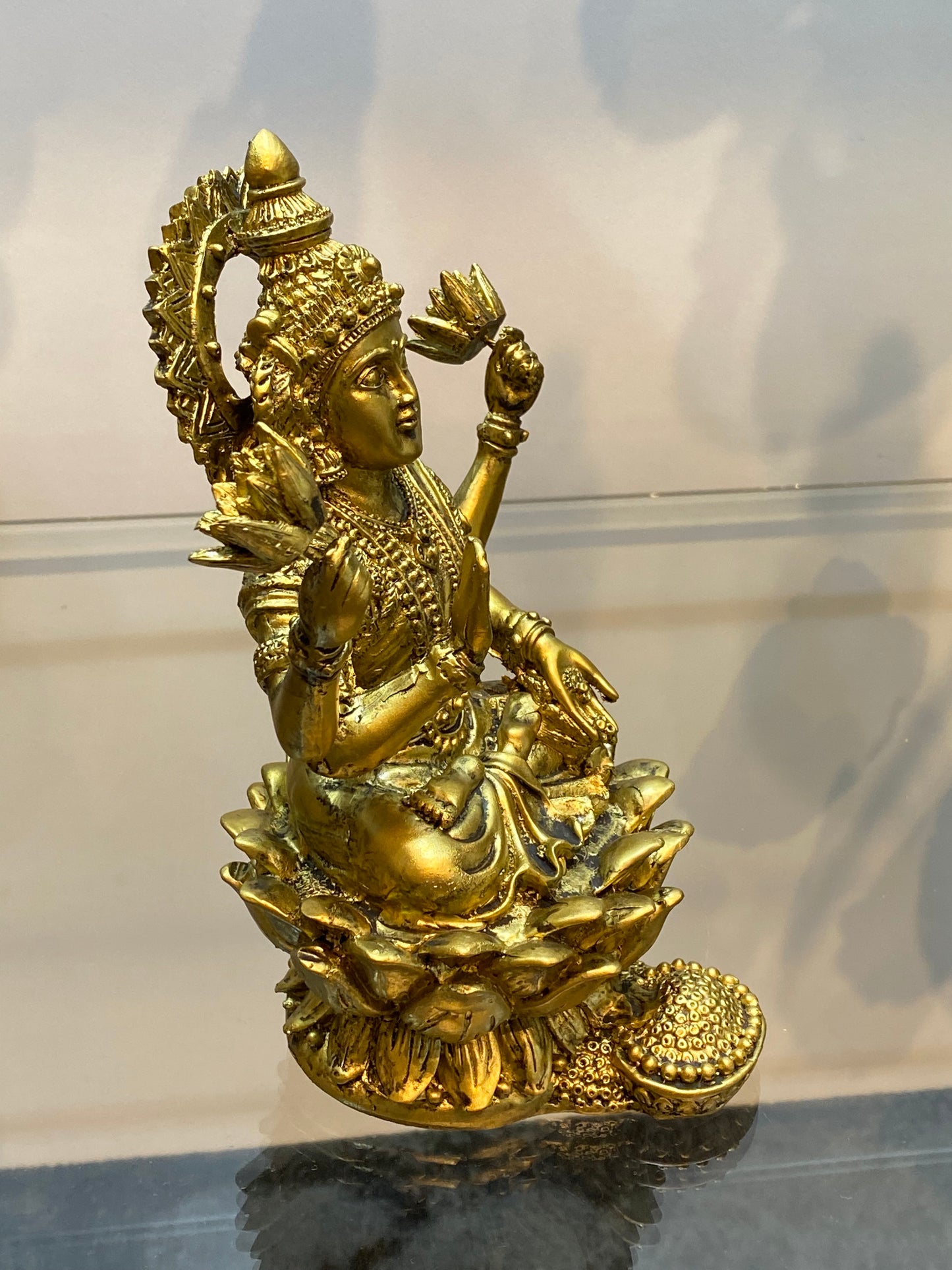 Goddess Lakshmi sitting on Lotus Raining Gold Coins Antique Golden Color