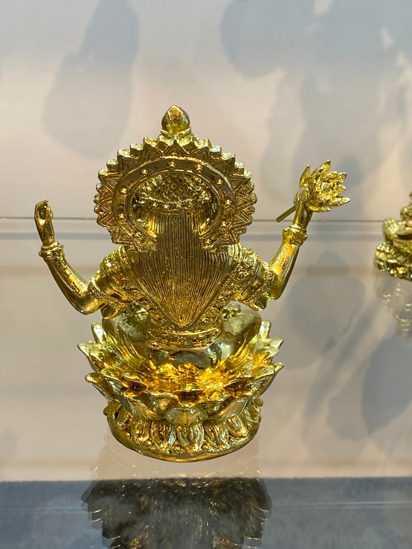 Goddess Lakshmi on Lotus Raining Gold Coins Bright Golden Color