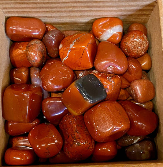 Red Jasper Stone with deep earthy red tones, polished and tumbled.