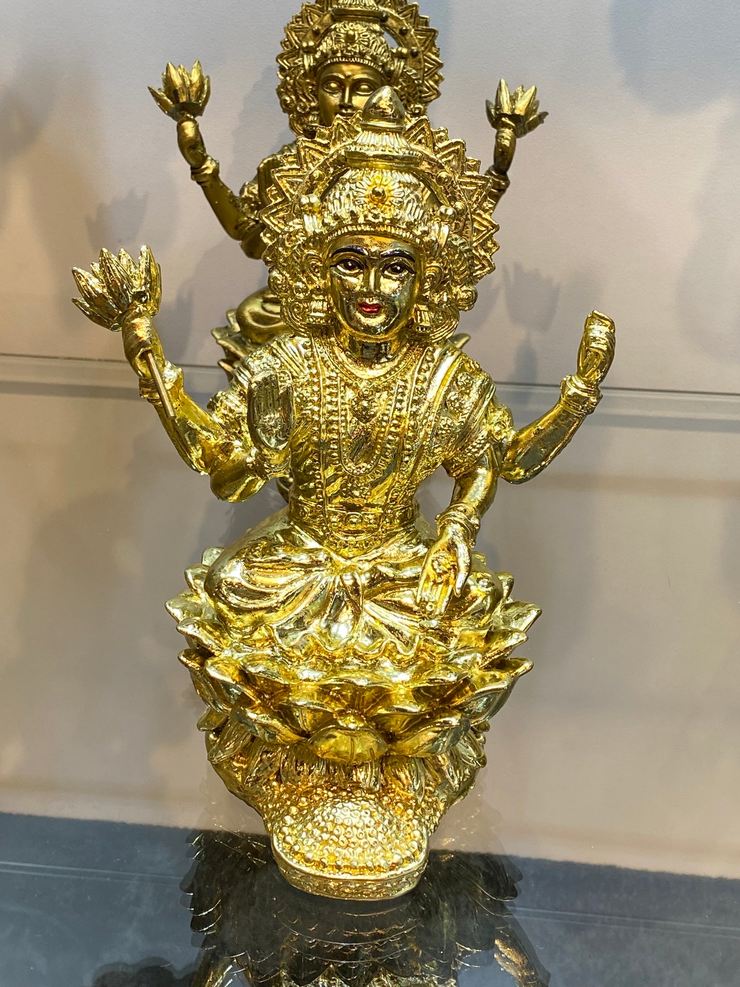 Goddess Lakshmi on Lotus Raining Gold Coins Bright Golden Color