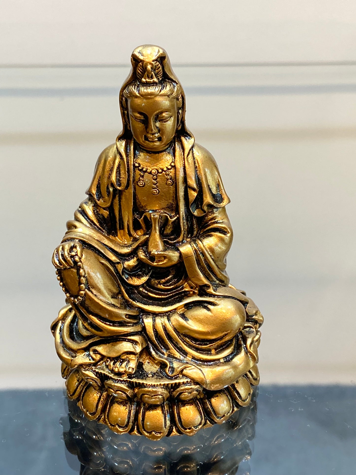 Gold Kwan Yin Figurine, Goddess of mercy and compassion seated on a Lotus Flower