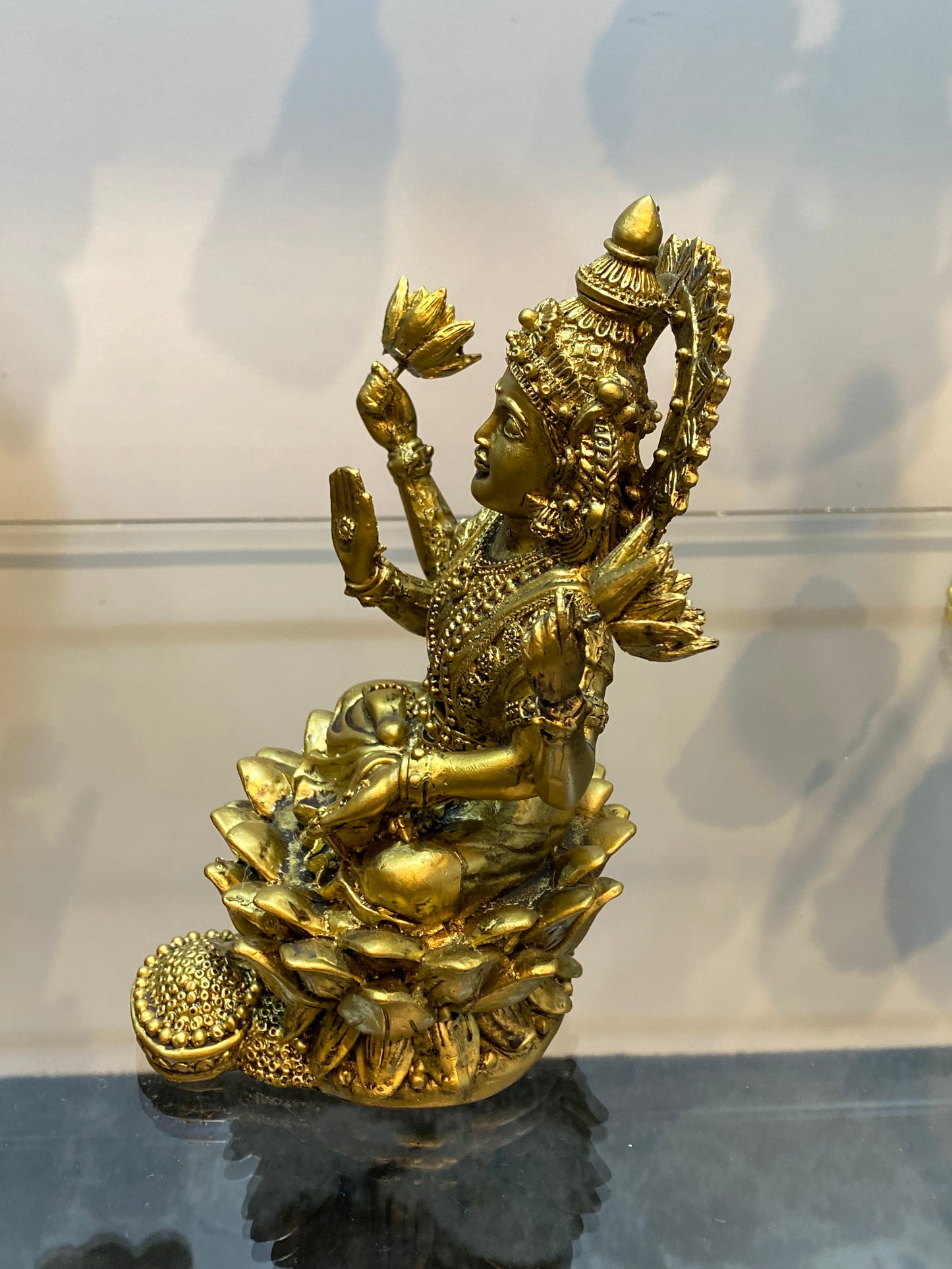 Goddess Lakshmi sitting on Lotus Raining Gold Coins Antique Golden Color