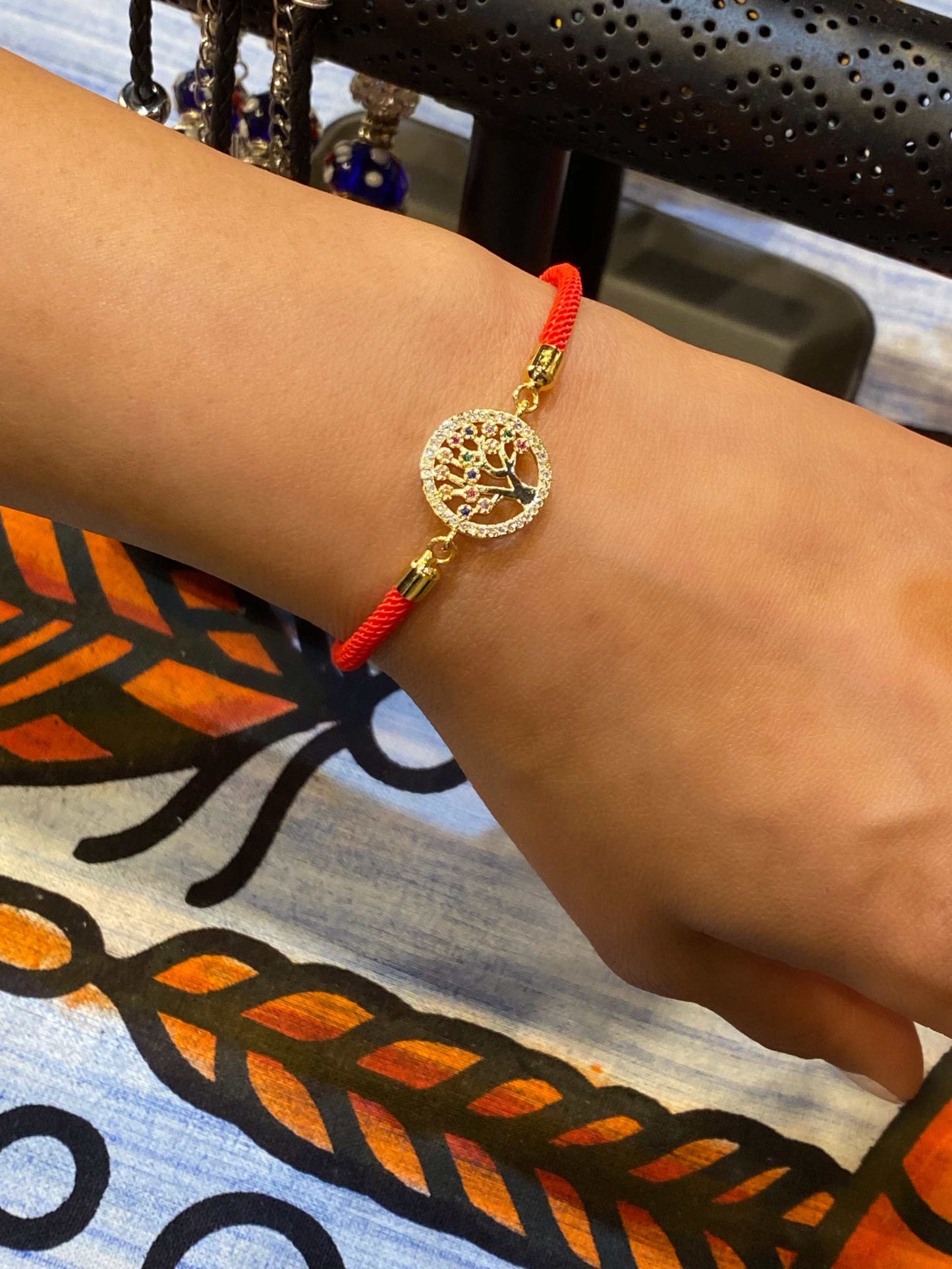 Red Rope Colorful Tree of Life Bling Bracelet with sparkling charm and vibrant red band.