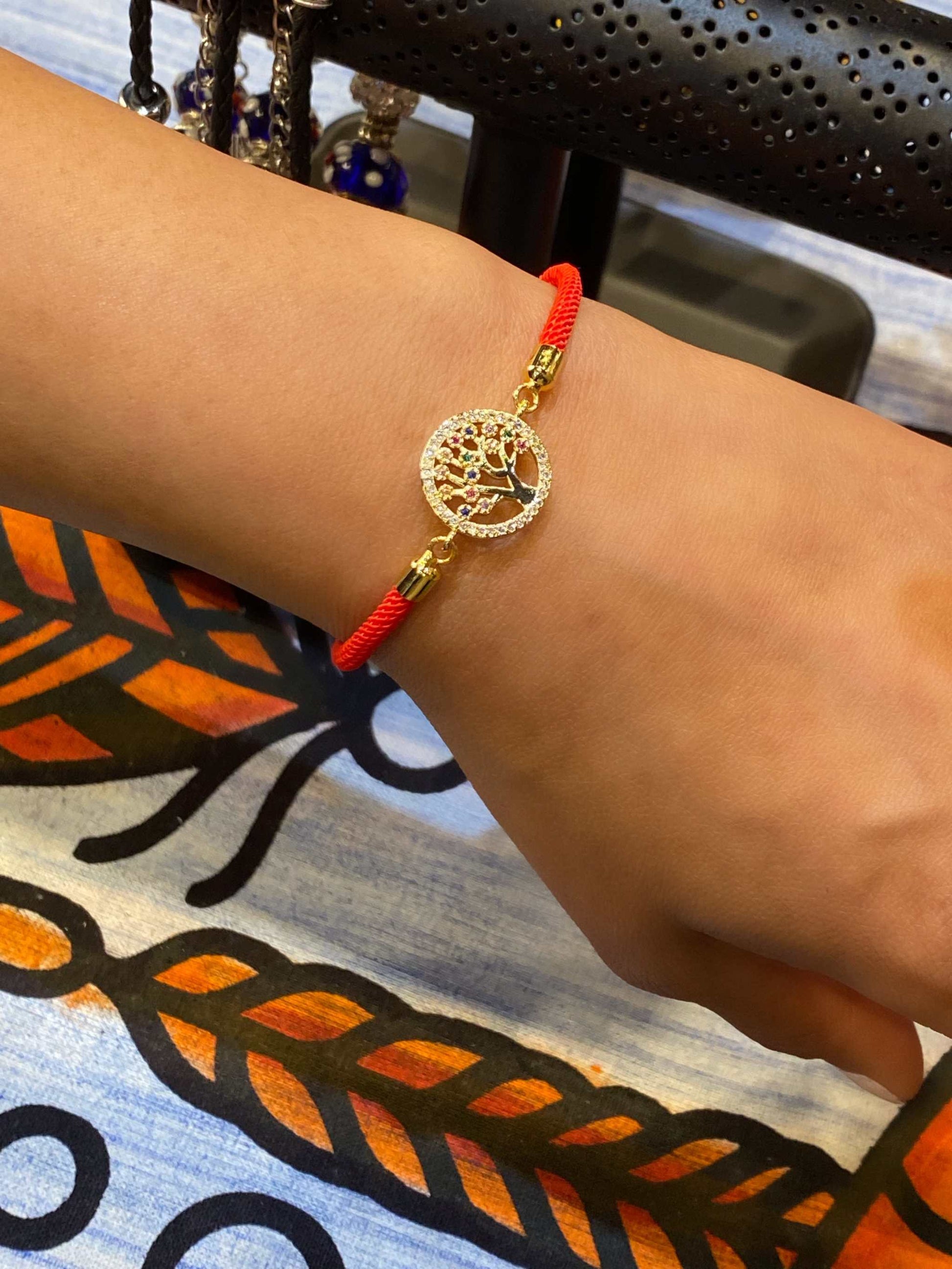 Red Rope Colorful Tree of Life Bling Bracelet with sparkling charm and vibrant red band.