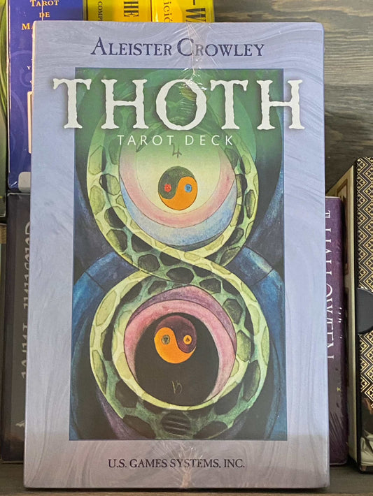 Thoth Tarot Deck box featuring esoteric artwork and the name Aleister Crowley.