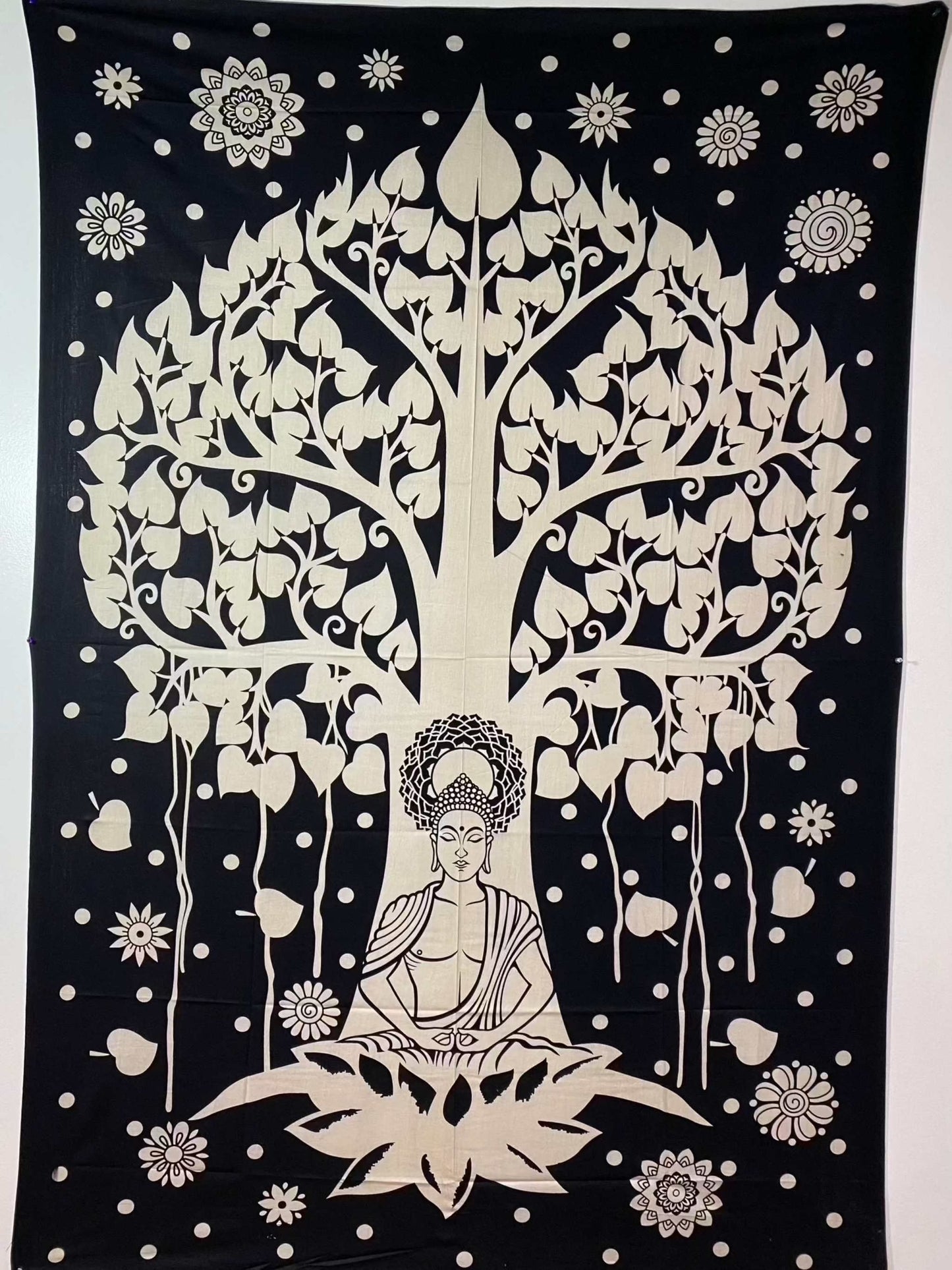 Buddha and Bodhi Tree Tapestry featuring Meditation Buddha under Bodhi tree in black and cream textile.