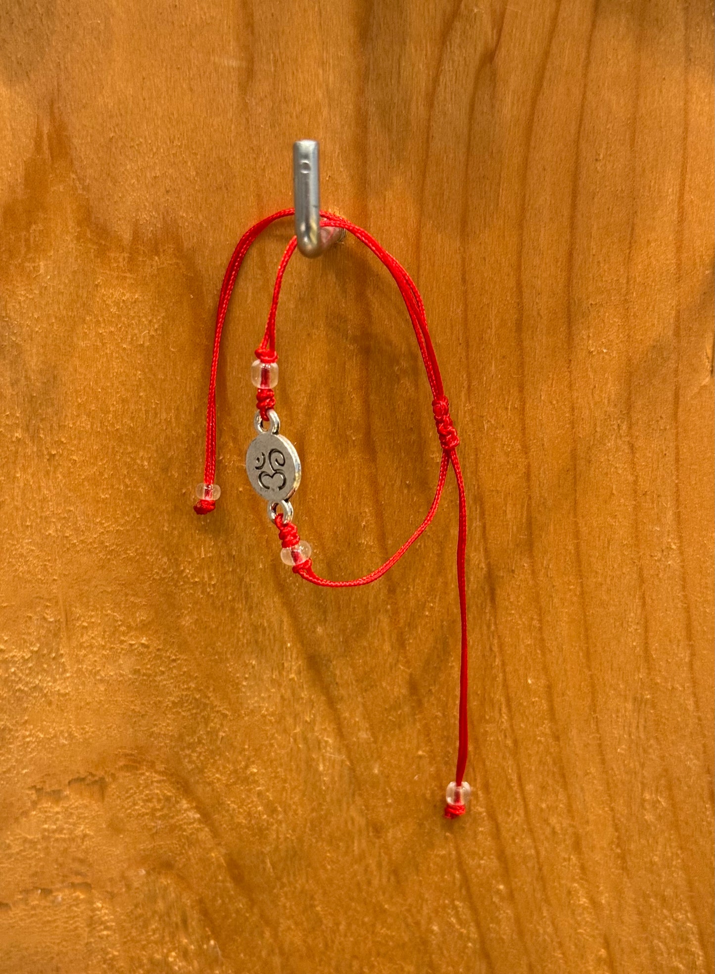 Red String Om Pull String Bracelet