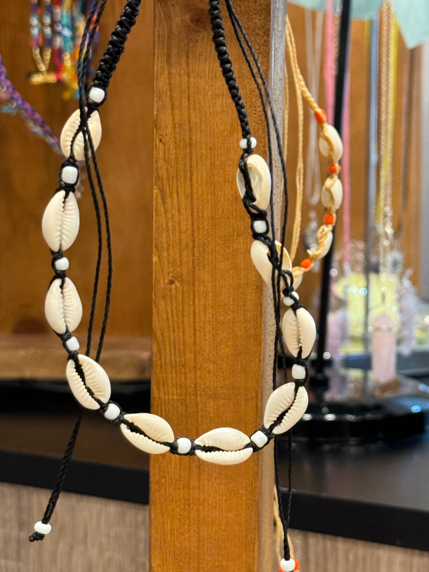 Handmade Cowrie Natural Shell String Pull Tie Choker Necklace White Beads On A Black Necklace